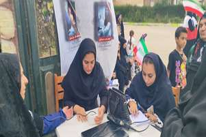 مراسم جانفدایان با حضور رئیس شبکه بهداشت و درمان شهرستان کوار و برپایی میز خدمت تیم سلامت